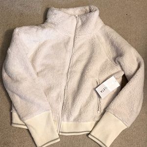 Womens Athleta Tugga Sherpa jacket. Size L. Cream with silver at cuffs and waist